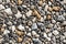 Pile of pebble stones as a background texture pattern