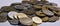 Pile of peseta coins with white background