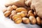 Pile of potatoes lying on wooden boards. Fresh healthy potato