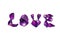 A pile of purple rose corollas of the word LOVE on white isolated background