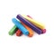 Pile of rainbow colored chalks isolated