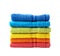 Pile of rainbow colored towels isolated