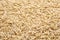 Pile of raw unpolished rice as background