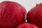 Pile of red appl with clear water drop on  shell surface texture pattern isolated