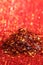 Pile of Red Chillies pepper on glitter backdrop