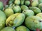 A pile of ripe local mangoes stored for sale