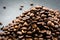 Pile of Roasted Coffee Beans on a Black Background