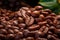 a pile of roasted coffee beans with leaves in the background