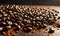A pile of roasted coffee beans on a table.