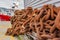 Pile of rusted chains at a boatyard