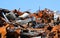 pile of rusty ferrous scrap in a landfill of a foundry