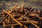Pile of rusty used nails on the ground focus on the cottonwood s
