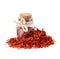 Pile of Saffron in glass jar, isolated on white background. Dried saffron spice