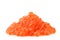 Pile of salmon caviar close up on a white. Isolated
