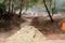 Pile of sands in front of chinese graveyard entrance way in Trang Thailand