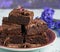 Pile of square baked pieces of chocolate Brownie cake