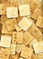 Pile of square salty crackers background. Many baked graham crackers