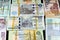 Pile and stacks of Egyptian money currency cash banknotes put together with rubber bands in different bill values of 1 LE, 5, 10,