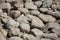 Pile of stones view. Preparing to fill the Foundation for the construction of a residential building or laying a garden