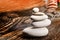 Pile of stones on wooden table