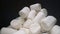 Pile of sweet and soft marshmallow. Yummy white sweets on dark background, fast food