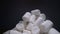 Pile of sweet and soft marshmallow. Yummy white sweets on dark background, fast food