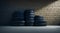 A pile of tires sitting in front of a brick wall