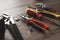 pile of tools for repair on a wooden background