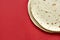 A pile of tortilla wraps on a red background