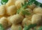 Pile of Uncooked Gnocchi with arugula