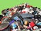 Pile of used Electronic and Housewares Waste Division broken or damage with green background, E-waste for Reuse and Recycle and is