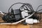 Pile of used smartphone wired chargers,electronic waste,tech device tools