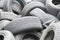 Pile of used tires. Old tyres waste for recycle or for landfill. Black rubber tire of car. Pile of used tires at recycling manufac