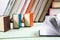 Pile of various books on wooden background