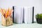 Pile of various books on wooden background