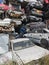 Pile of various scrap cars and other metals on a junk yard ready recycling industry.