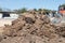 Pile of waste soil dirt on a construction site