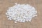 Pile of white kidney beans on the burlap close-up