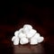 Pile of white marsmallows macro on dark background with copy spa