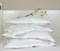 Pile of White Sleeping Pillows