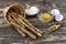 A pile of whole wheat flour with sunflower seeds grissini breadsticks