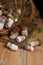Pile of wild porcini mushrooms on wooden background at autumn season