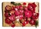 Pile of withered red roses is placed on a wooden board - an artistic decadence look