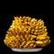 Pile of yellow bananas on a white plate on black background