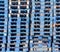 Piled blue wooden euro pallets background pattern