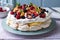 piled high with fruit and cream, meringue making a refreshing and light dessert