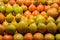 Piled Spanish tomatoes, red and green