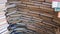 Piles of books beautifully stacked in a row