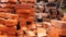 Piles of brick, Red brick for building houses. Many used wall bricks laid on a pile