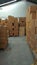 Piles of cardboard packages that fill the warehouse space2